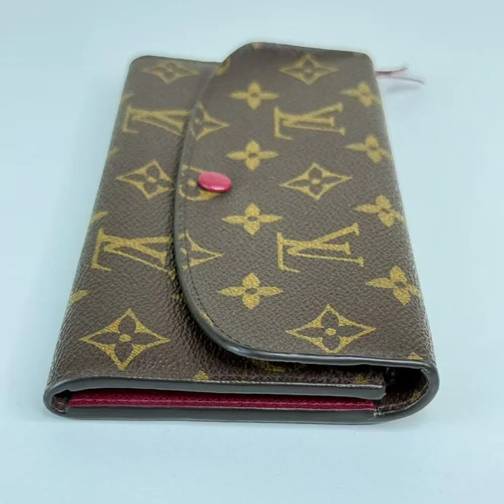 Louis Vuitton Monogram Canvas Wallet with Classic LV Pattern and Red Button